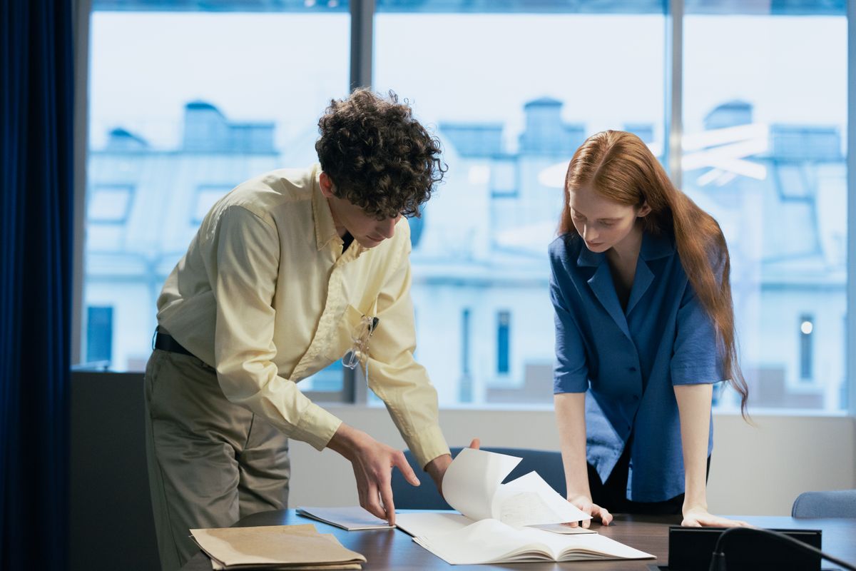 Two colleagues reviewing a client's audit together